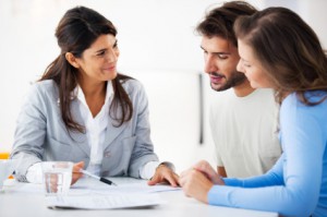 Couple meeting with financial advisor.